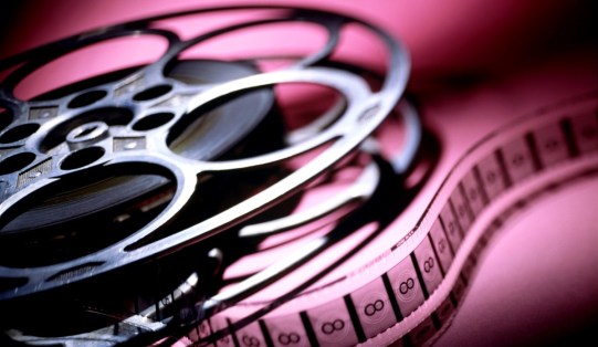 Film reel with leader showing, close-up